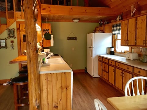Kitchen with sitting area at the bar.