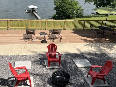 Lower level deck overlooking the lake and dock.   