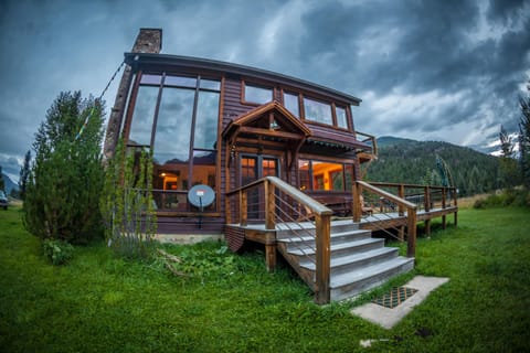European Mountain Chalet with wrap around deck.
