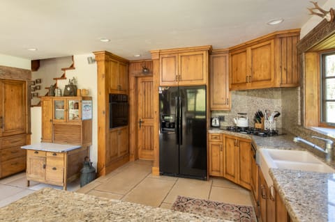 Wrap around granite countertop, top of the line appliances, and pantry.