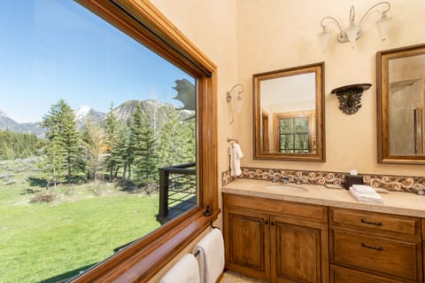 Upstairs bathroom. Anywhere in this house you'll be in awe of the views.