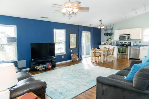 Open floor plan with large smart TV where you can login to your favorite apps.