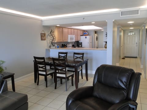 Dining table/chairs seats six.