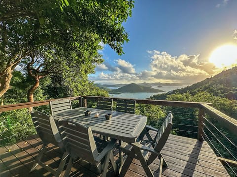 Enjoy panoramic views from your private deck overlooking Coral Bay!
