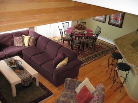 Main living, dining and kitchen area on main floor.  Attached balcony with view 