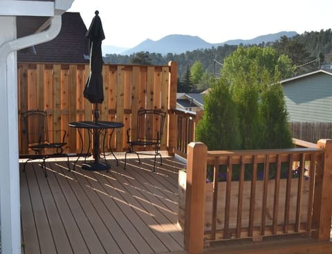 Deck with patio table and umbrella