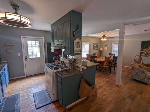 Open floor plan--kitchen, living room, and 2 dining areas