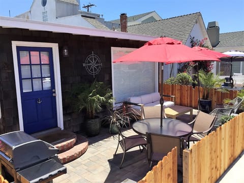 Shared front patio. The Dock is the back unit of this classic duplex.