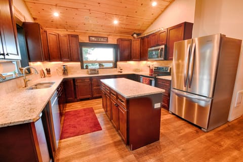 Fully equipped kitchen with blenders, coffeemaker, griddles, toasters, and more.