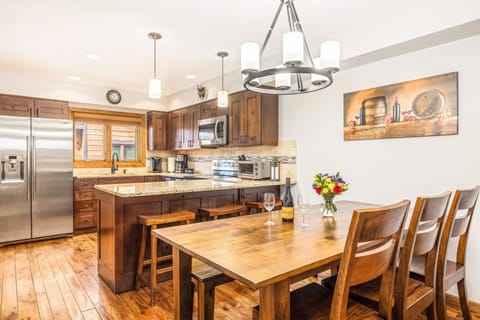 Remodeled, custom-built kitchen with high end appliances, cabinets and floors.