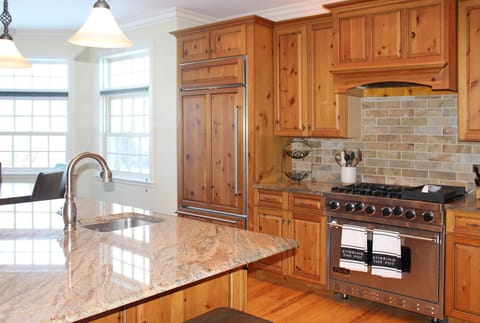 6-burner Viking Range/oven, wine fridge, Sub Zero refrigerator. 