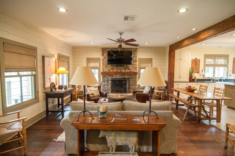 Living room with wood burning fire place