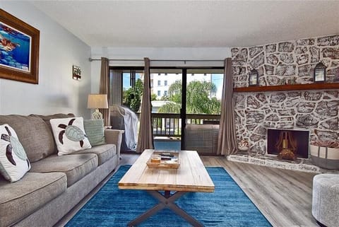 living room opens up to a patio with