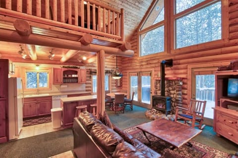 Spacious kitchen island with additional seating, perfect for casual dining and gathering.