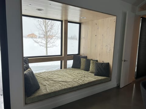 Huge window seat for reading, napping and playing board games