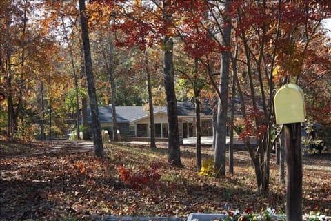 View of house in the fall from Old Duncan Bridge Road.