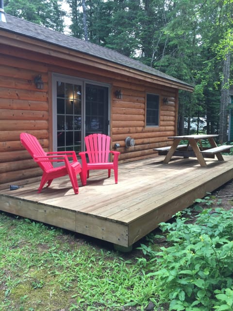 Guest cabin with deck and lake view