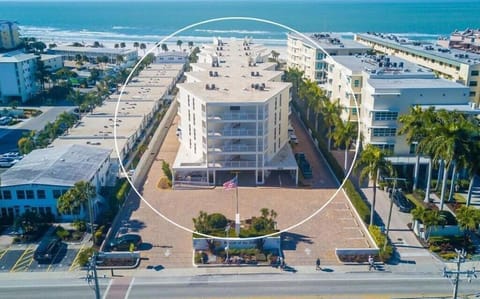 House of the Sun is on the beach, located  across from Captain Curts Plaza.