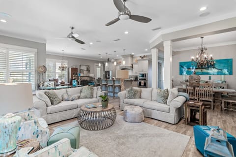 Living room area with two couches, one sofa sleeper.  All custom furniture.