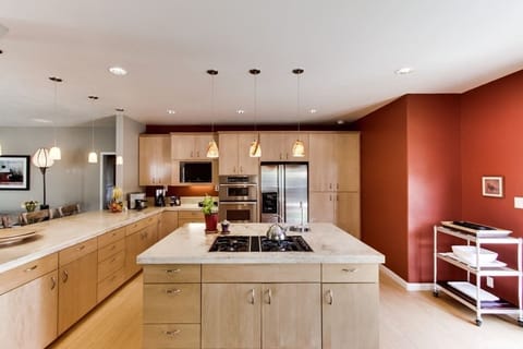 Fully equipped kitchen with center island and 24 inch flat screen TV.