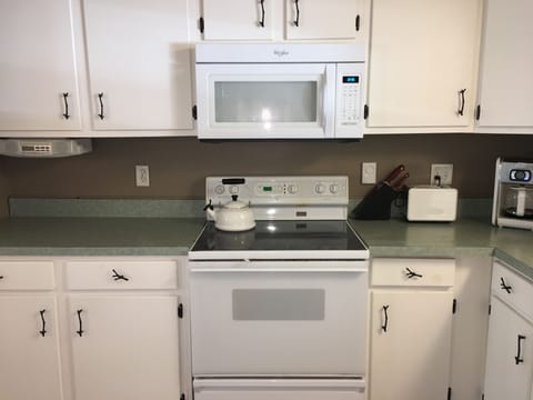 This kitchen is authentic! It is filled with the staples and tools you will need