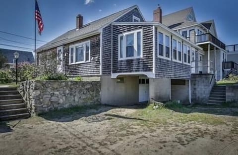 Enjoy the airy screened in porch day or night and parking for 3 cars.