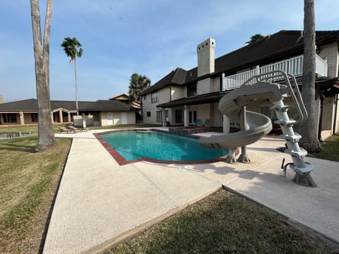 Heated pool, hot tub, waterslide, lounge area