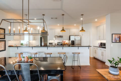bar and dining eating area off the kitchen/ living space.
