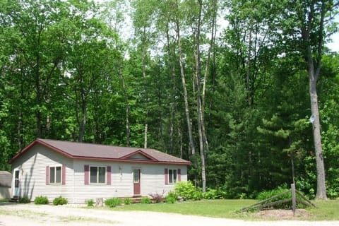 Topinabee Pines cottage in summer, from the 'road'