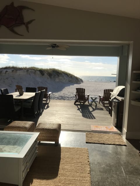 View from the living room.  Sliding doors open letting the outside in.