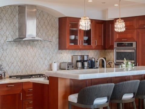 Fully Equipped Gourmet-Style Kitchen with Bar Seating | Solara Luxe Pool...
