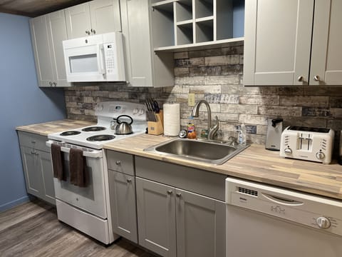 All new kitchen with pots, pans, dishes, glasses provided