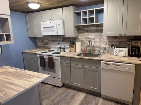 All new Kitchen with pots, pans, dishes, silverware, coffee pot glasses provided