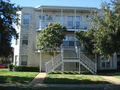 left corner  3rd fl unit with balcony facing Speedway.  