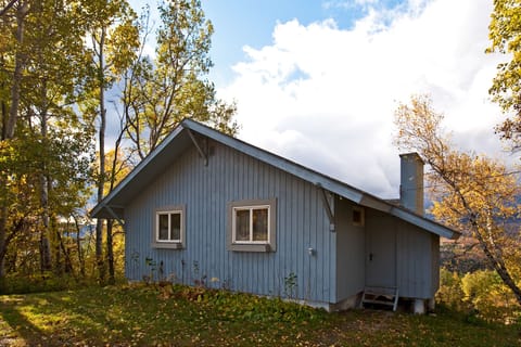 Street view of house with large parking area. Waitsfield center 1 mile away.