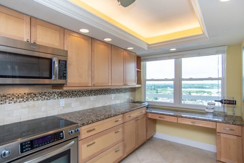 Inter coastal views enhance the well stocked kitchen. 