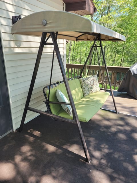 Porch swing on deck........great for morning coffee!