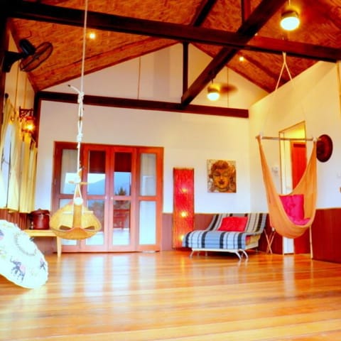 Lounge and hammocks for relaxing atmosphere with indoor mountain & sea views