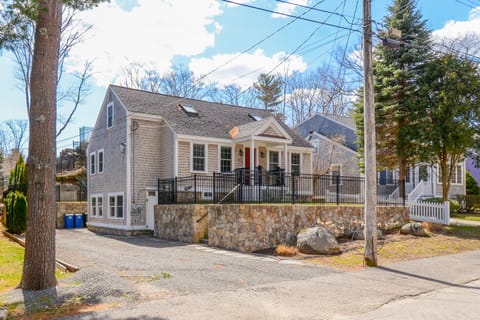 Street view, parking in driveway on left, on right parallel to street.