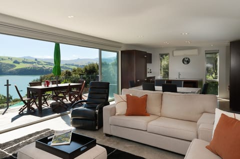 open plan living space that also opens up 
to deck.