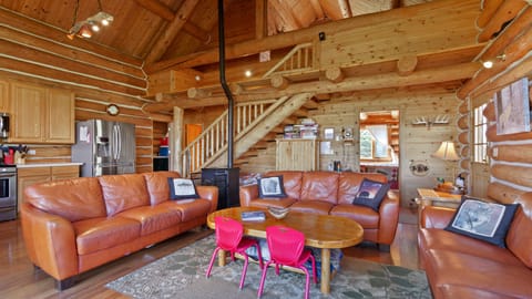 The living room has comfortable seating for nine, streaming TV, upgraded wifi.