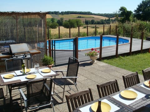 pool ,patio and view across the valley