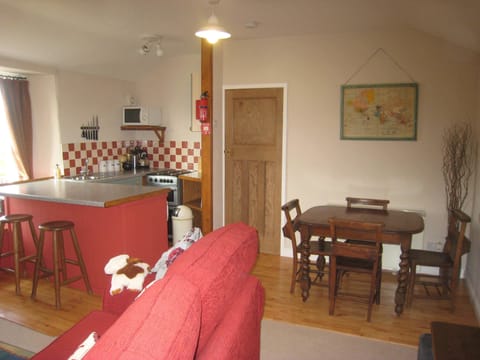 Living area showing kitchen and dining area