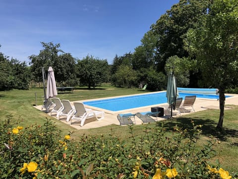 Heated, private pool in large garden. Table tennis, tree house, boules, swings.