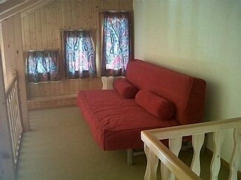 mezzanine with double bed on the first floor