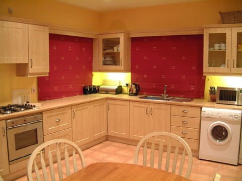Spacious and well equipped kitchen