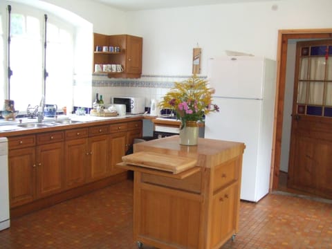 Large Country Style Kitchen with breakfast area.