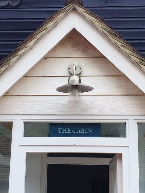 The Cabin is a semi detached house on a quiet private lane by the sea front.
