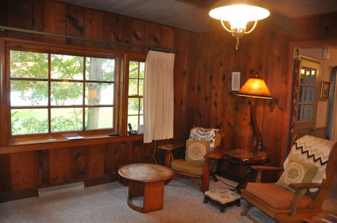 Living room with picture window looking out to the lake