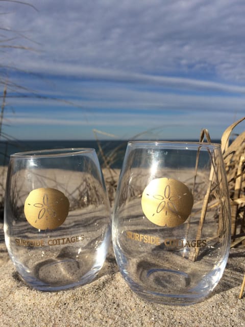 Enjoy your favorite drink by the ocean while staying at Surfside Cottages